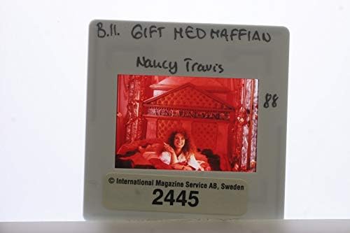 Пързалки снимка Нанси Травис в сцена от филма Омъжена за мафията