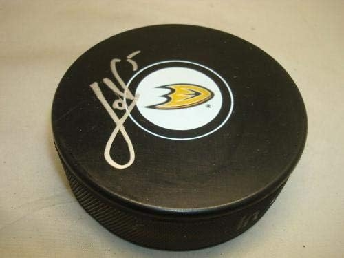Корбиньян Хольцер подписа хокей шайба Анахайм Дъкс с автограф на 1C - за Миене на НХЛ с автограф