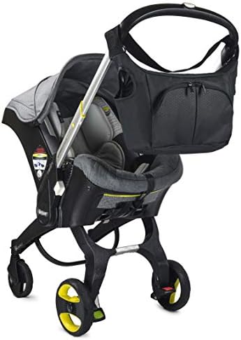 Незаменим чанта Baby & Beyond, съвместима с кош-автокреслом Doona, с допълнителни куки и каишки, съвместими с всяка универсална детска количка, се превръща в чанта-тоут за п?